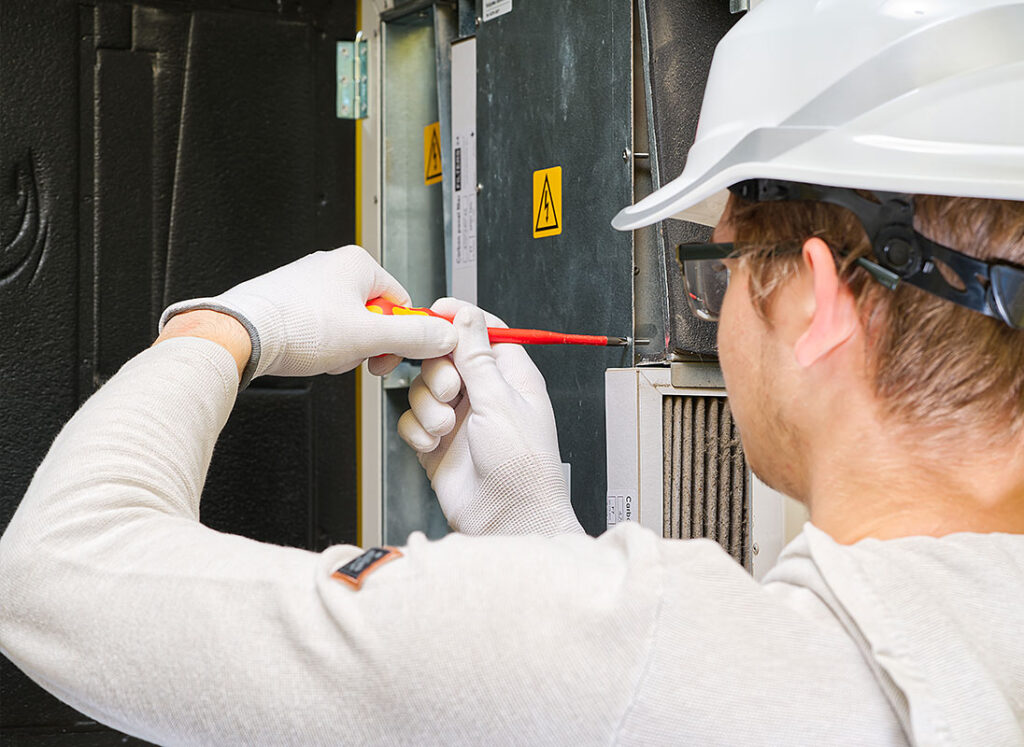 technician providing furnace maintenance and repair services